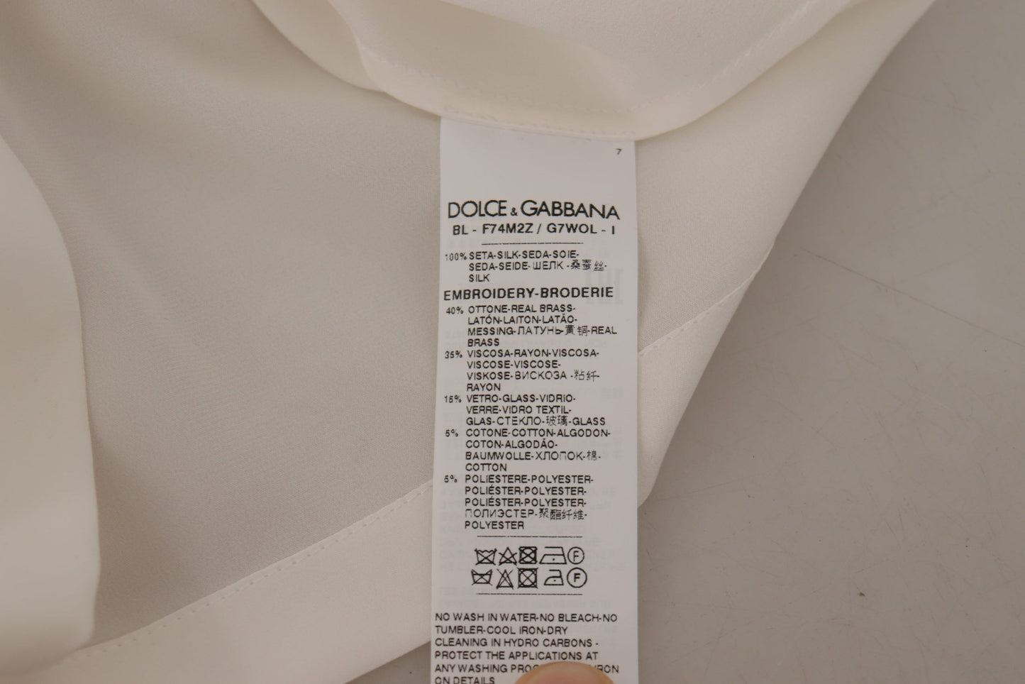 Dolce & Gabbana Élégant chemisier en soie avec broderie couronne dorée