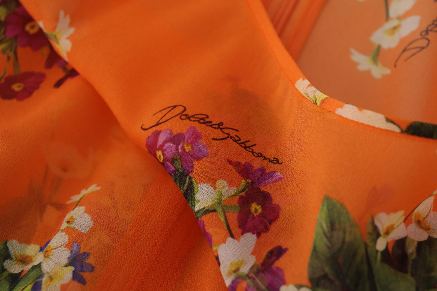Dolce & Gabbana Chemisier élégant en soie à fleurs avec fermeture éclair dans le dos