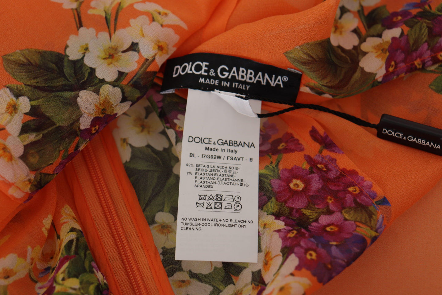Dolce & Gabbana Chemisier élégant en soie à fleurs avec fermeture éclair dans le dos