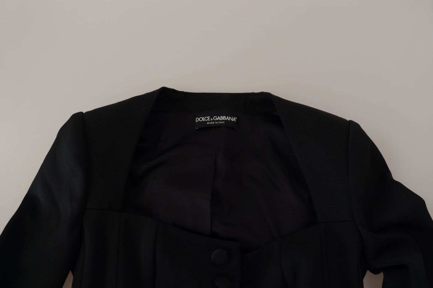 Dolce & Gabbana - Veste noire élégante à boutons-pression avec doublure en soie