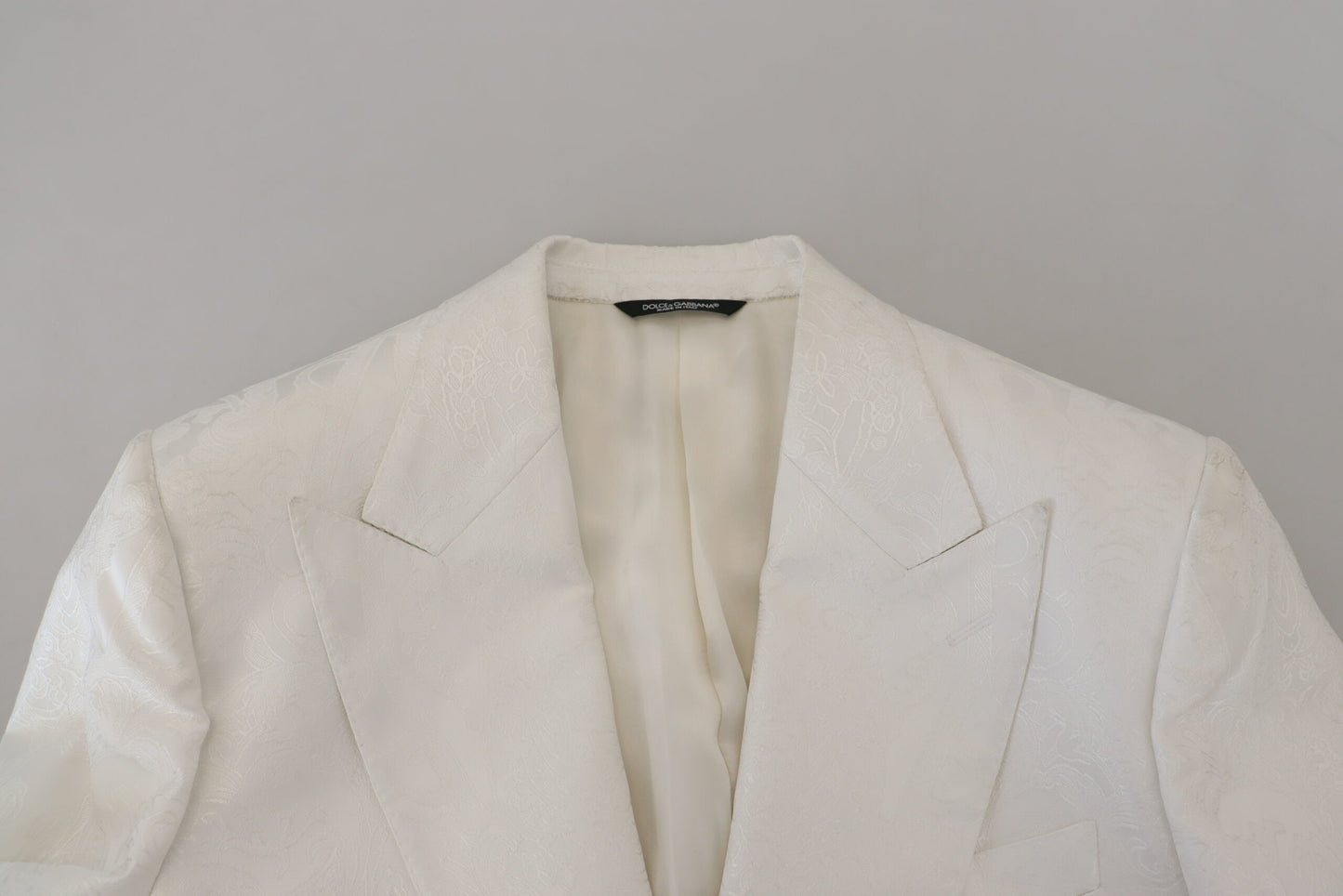 Trench-coat élégant en brocart floral blanc Dolce & Gabbana