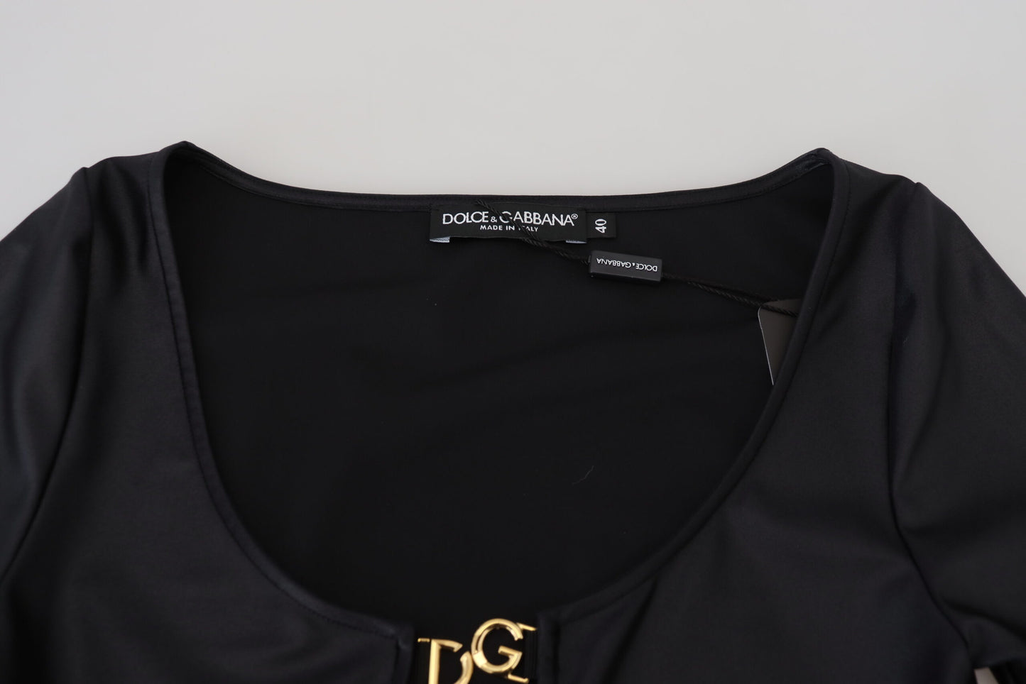 Dolce & Gabbana - Élégant haut noir à manches 3/4 avec détails dorés