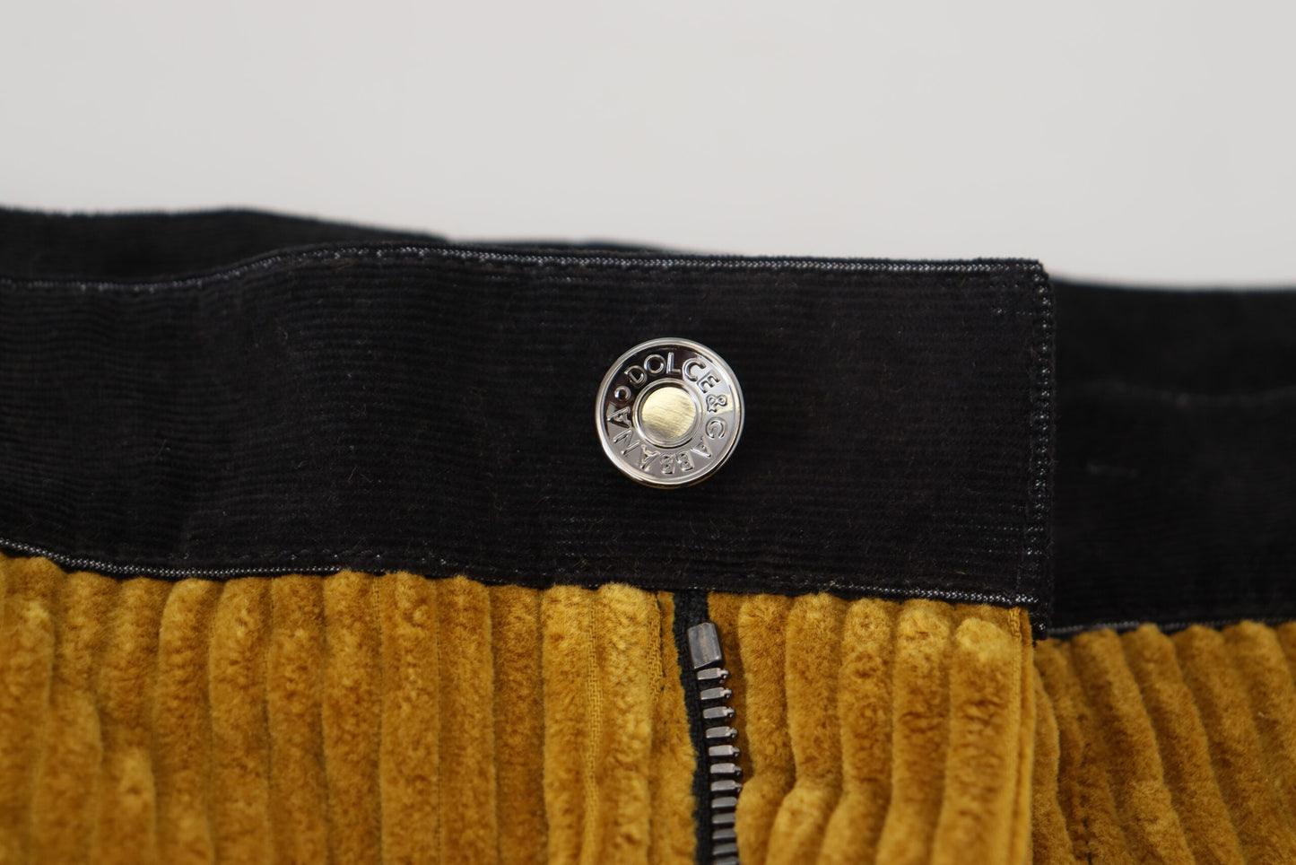 Pantalon fuselé noir élégant avec accents jaunes Dolce & Gabbana