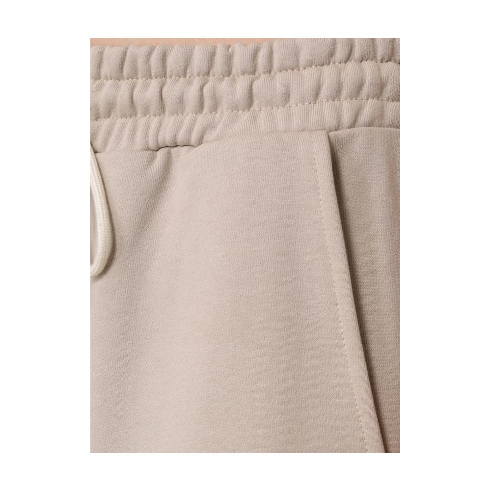 Comme Des Fuckdown Beige Cotton Jeans & Pant by Comme Des Fuckdown