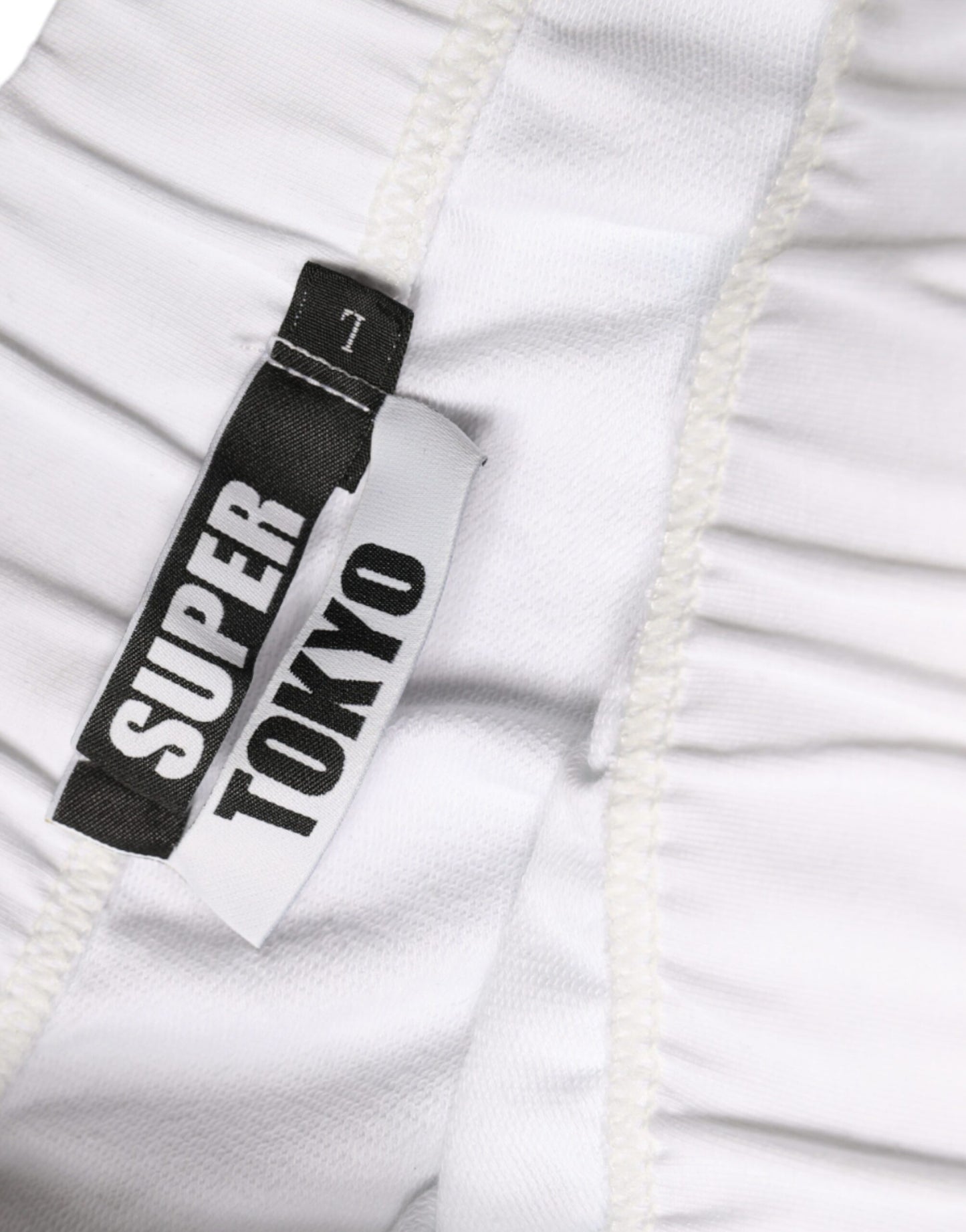 Jupe crayon taille haute en coton extensible blanc STK, longueur genou