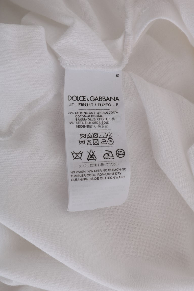 Dolce & Gabbana Élégant chemisier cache-cœur blanc avec accents de cristaux