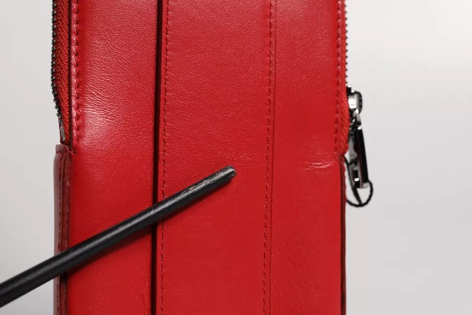 Porte-cartes zippé en cuir rouge Dolce & Gabbana avec logo et large bandoulière