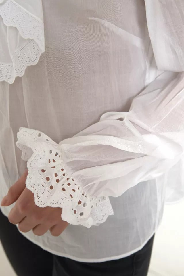 Chemisier à col roulé en coton blanc avec bordure en dentelle Dolce & Gabbana