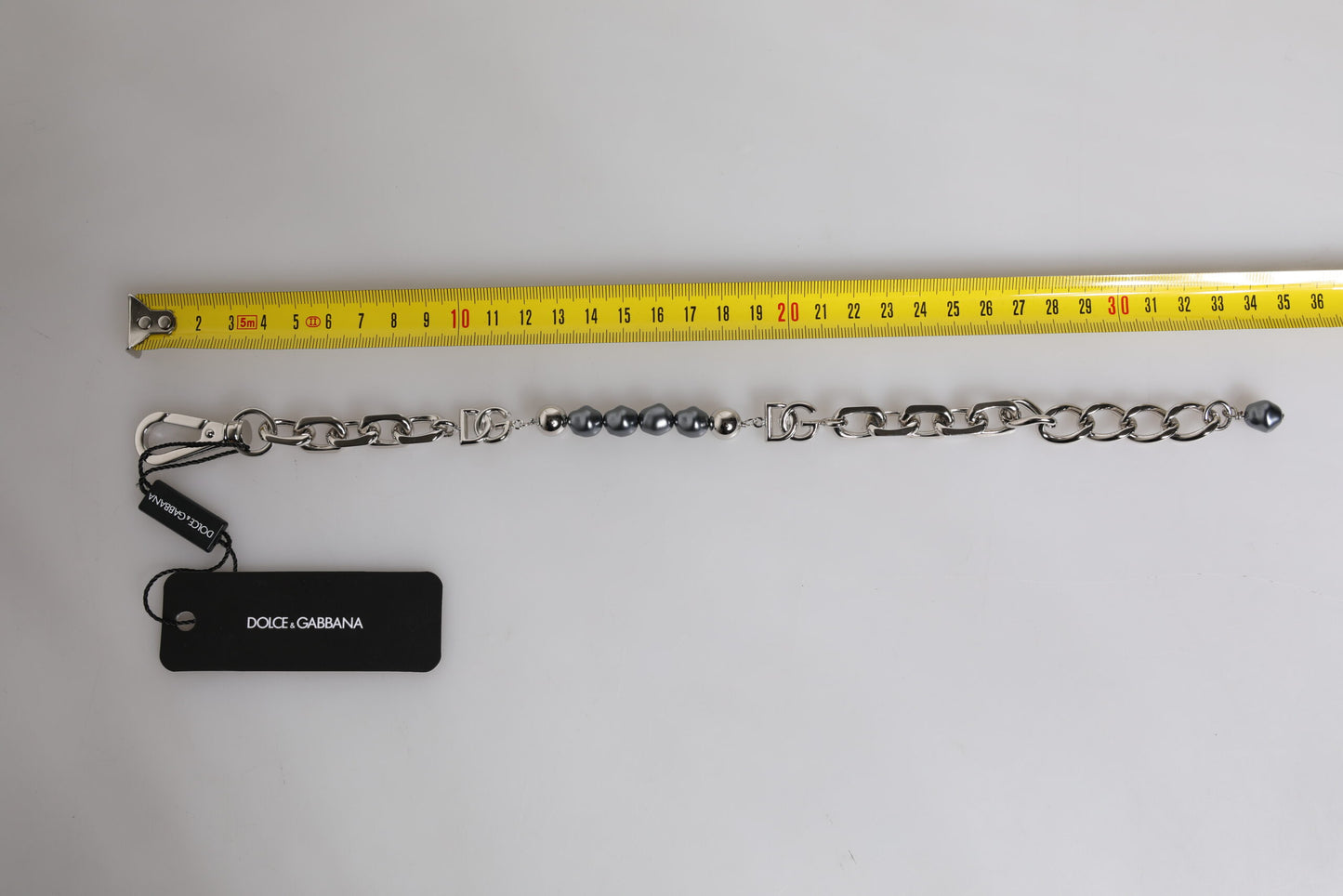 Bracelet Dolce & Gabbana en chaîne argentée avec fermoir mousqueton et perles grises