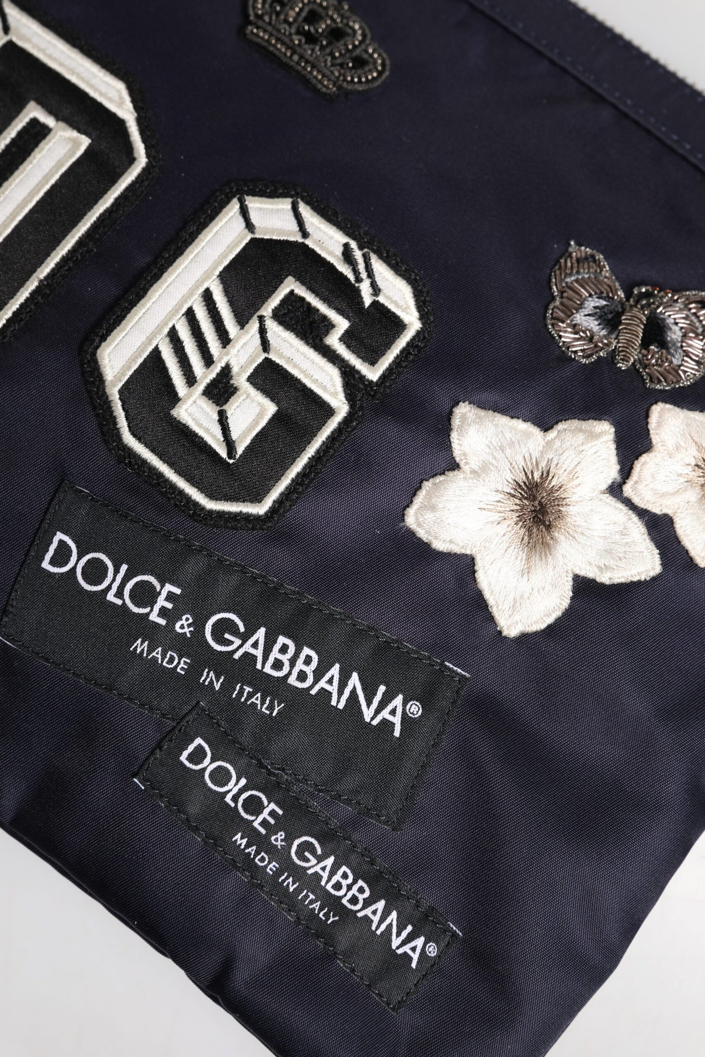 Pochette Dolce & Gabbana bleue ornée d'un patch logo DG