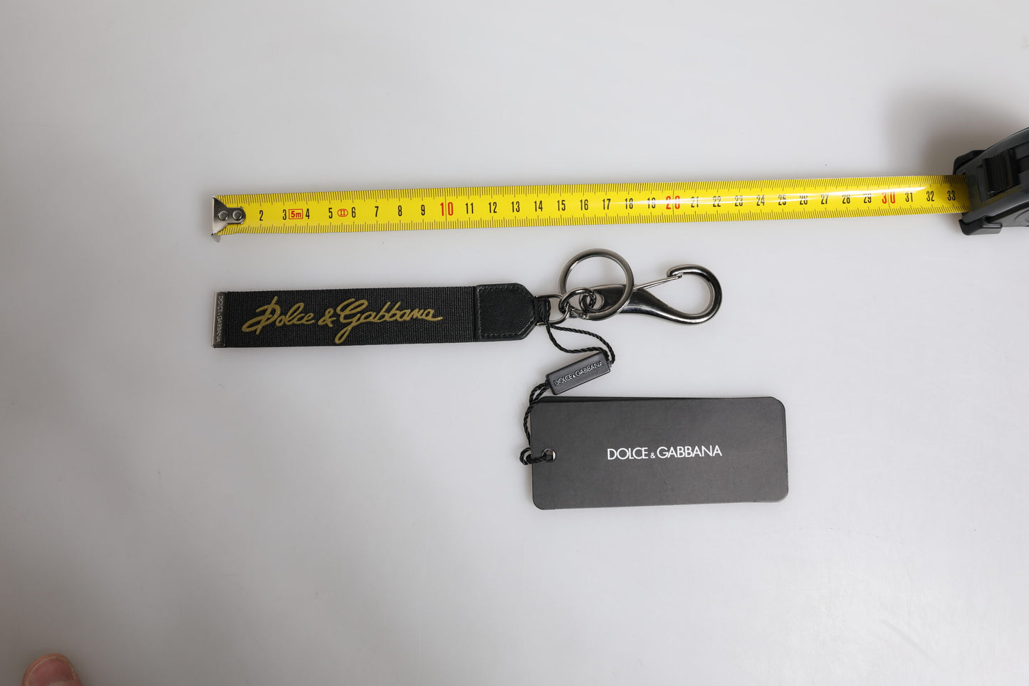 Porte-clés homme Dolce & Gabbana en nylon et laiton argenté avec logo noir