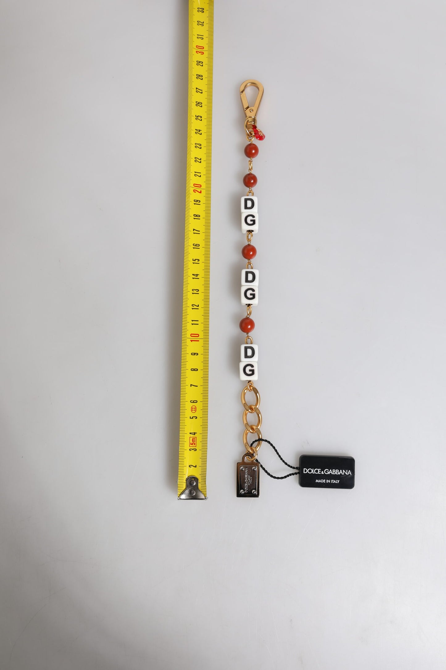 Bracelet Dolce & Gabbana en laiton doré multicolore avec logo DG
