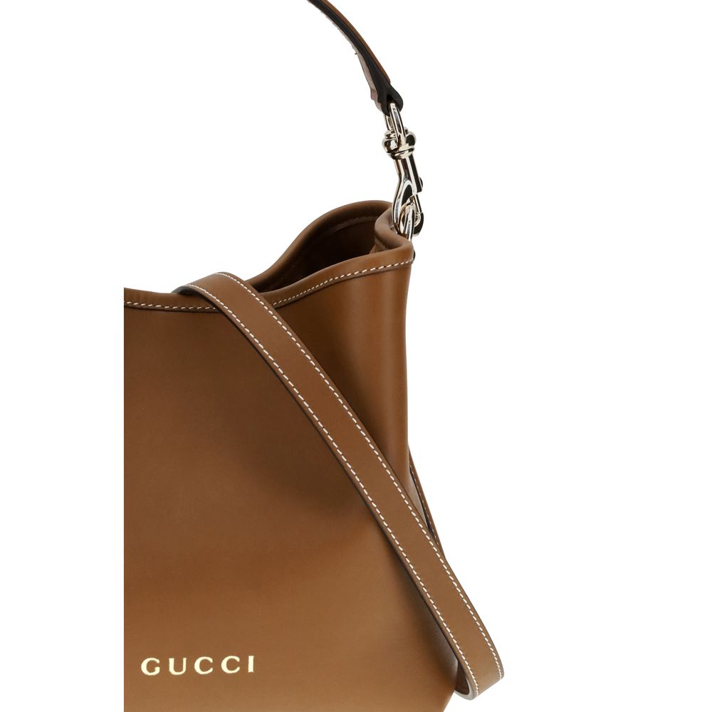 Sac seau en cuir Gucci avec emblème GG