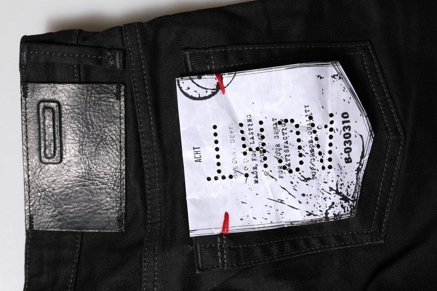 Huit jeans en denim noir coupe slim taille basse en coton