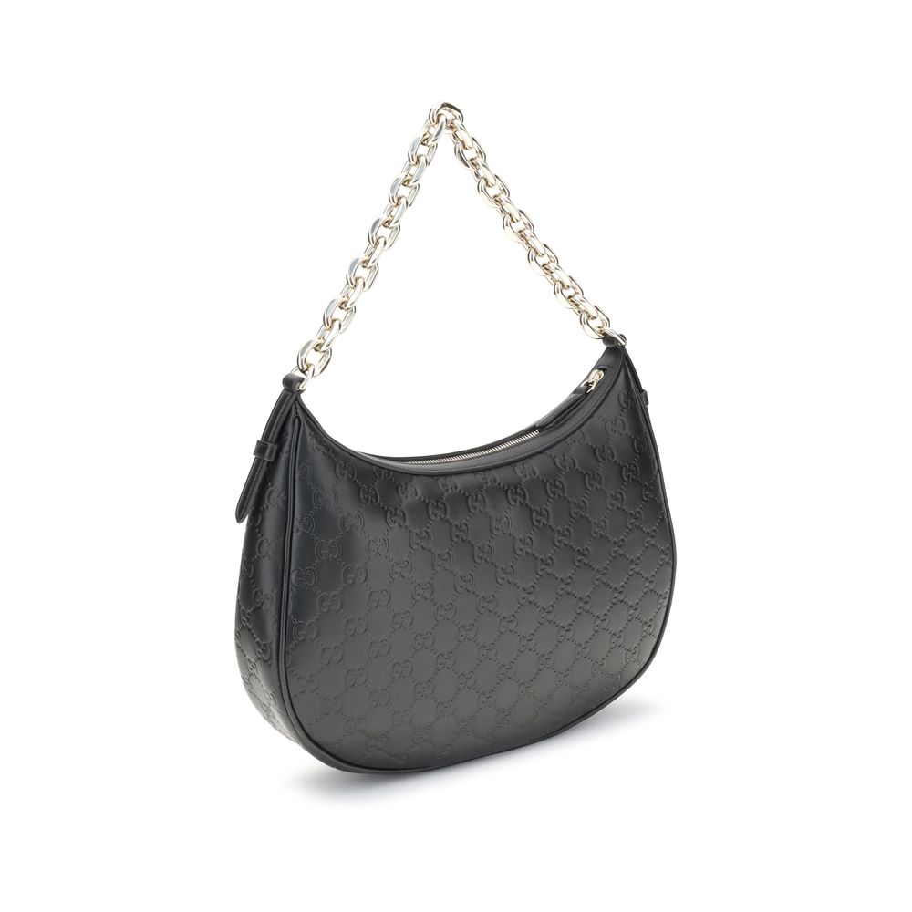 Sac à bandoulière Gucci avec emblème GG