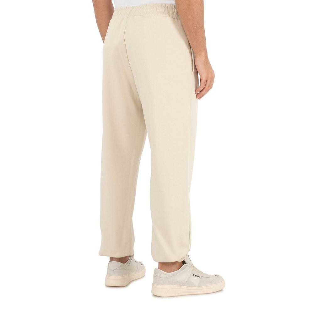 Comme Des Fuckdown Jeans et pantalon en coton beige