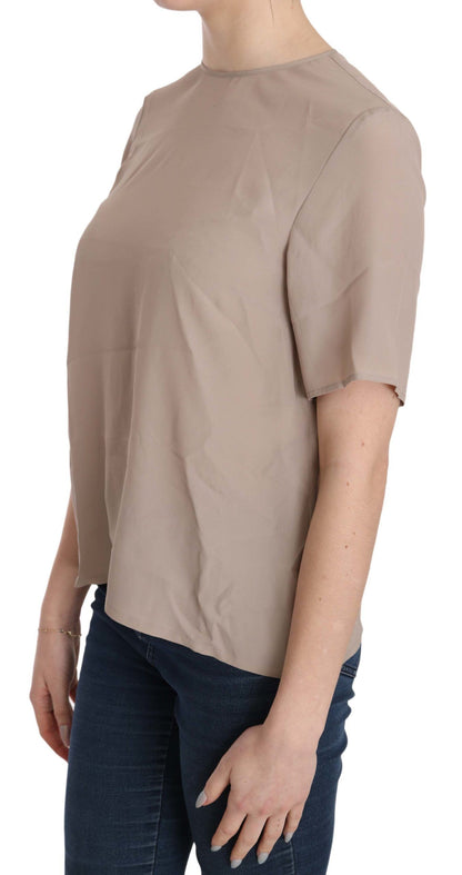 Dolce &amp; Gabbana Élégant chemisier à col rond en soie mélangée beige