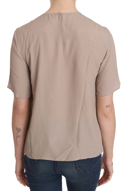 Dolce &amp; Gabbana Élégant chemisier à col rond en soie mélangée beige