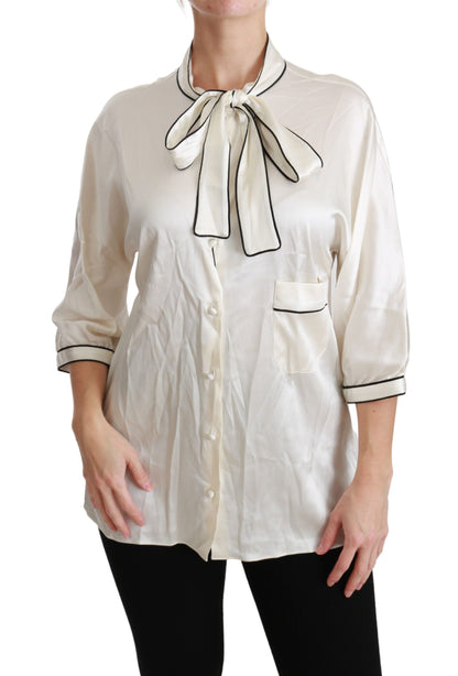 Dolce &amp; Gabbana Élégant chemisier en soie beige avec foulard à nœud