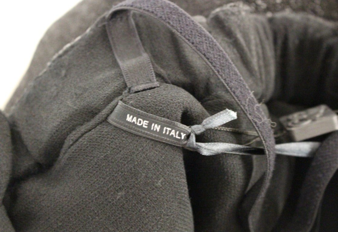 La Maison du Couturier Élégante Combinaison en Cuir Noir avec Ceinture