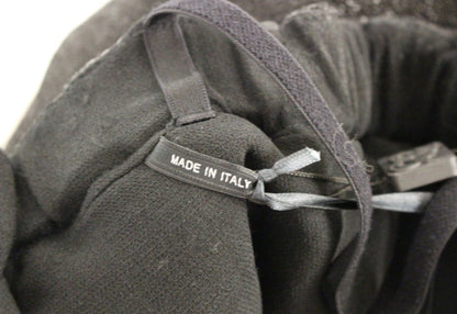 La Maison du Couturier Élégante Combinaison en Cuir Noir avec Ceinture