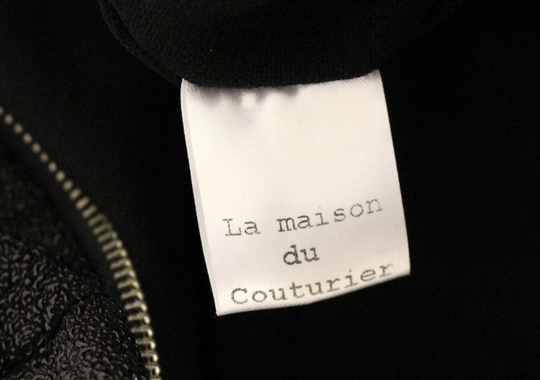 La Maison du Couturier Élégante Combinaison en Cuir Noir avec Ceinture