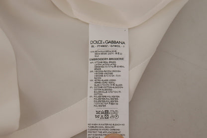 Dolce &amp; Gabbana Élégant chemisier en soie avec broderie couronne dorée