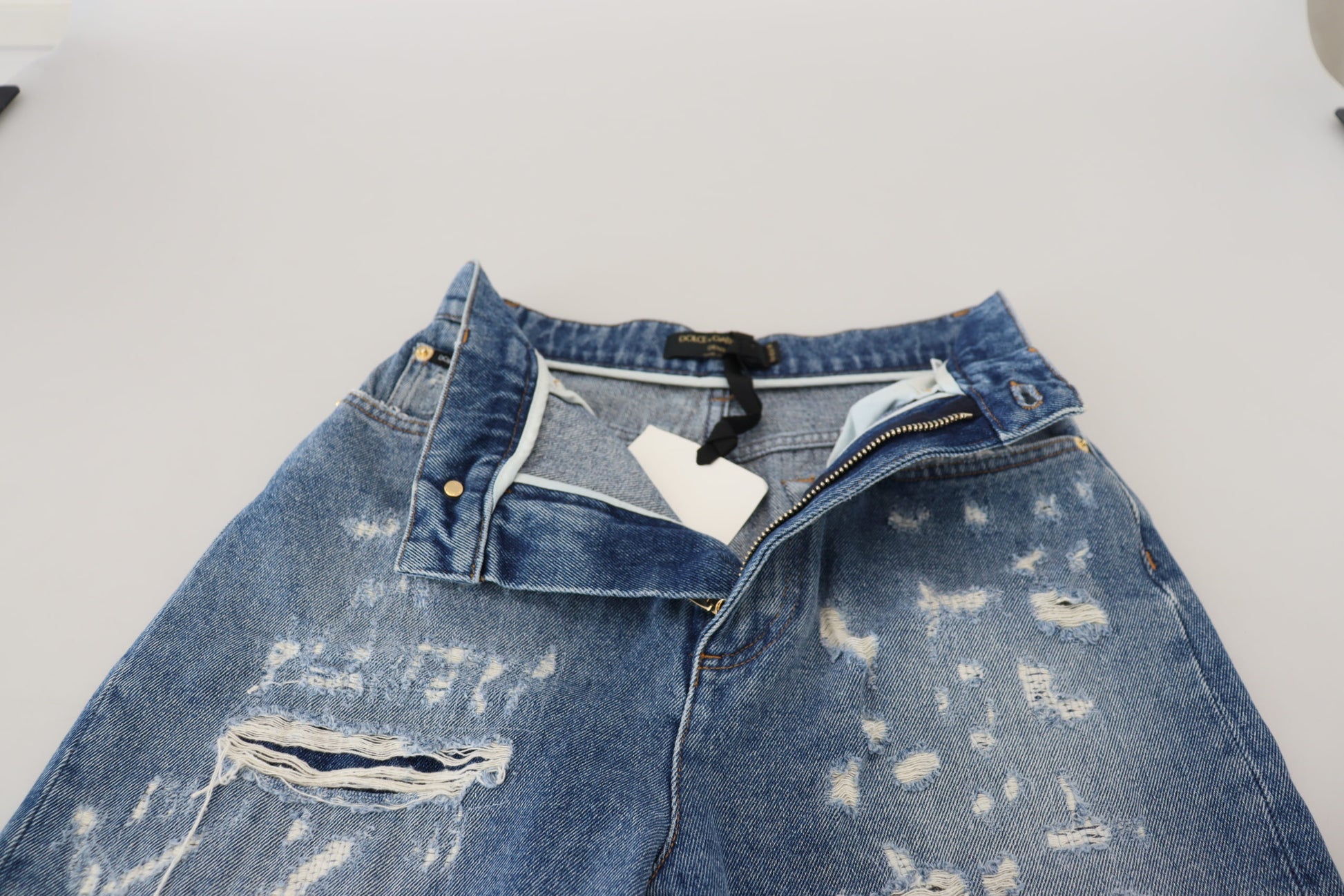 Dolce & Gabbana Blue Washed Cotton Tattered Denim Jeans by Dolce & Gabbana