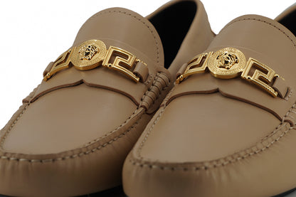Mocassins Versace en cuir doré Medusa Exquisite