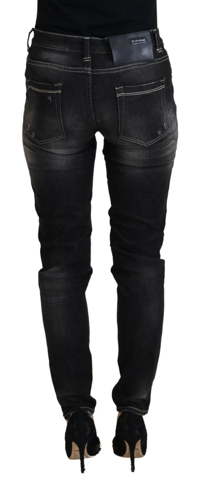 Huit jeans noirs élégants fuselés taille moyenne