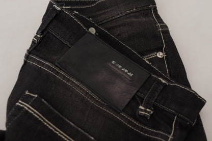 Huit jeans noirs élégants fuselés taille moyenne