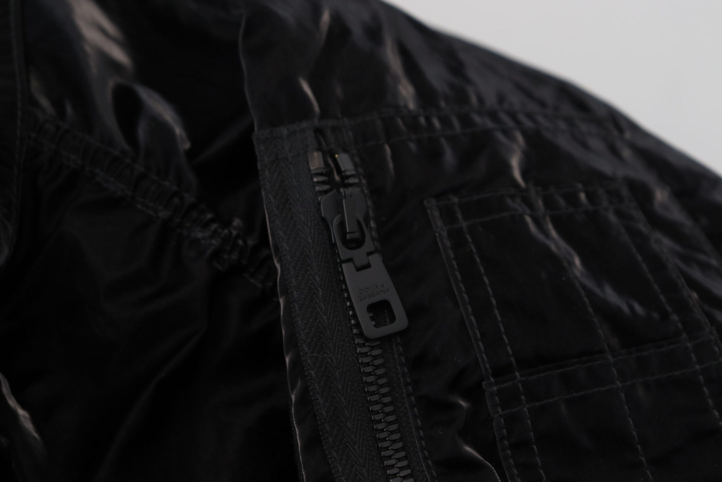 Dolce &amp; Gabbana Élégant blouson aviateur noir à capuche