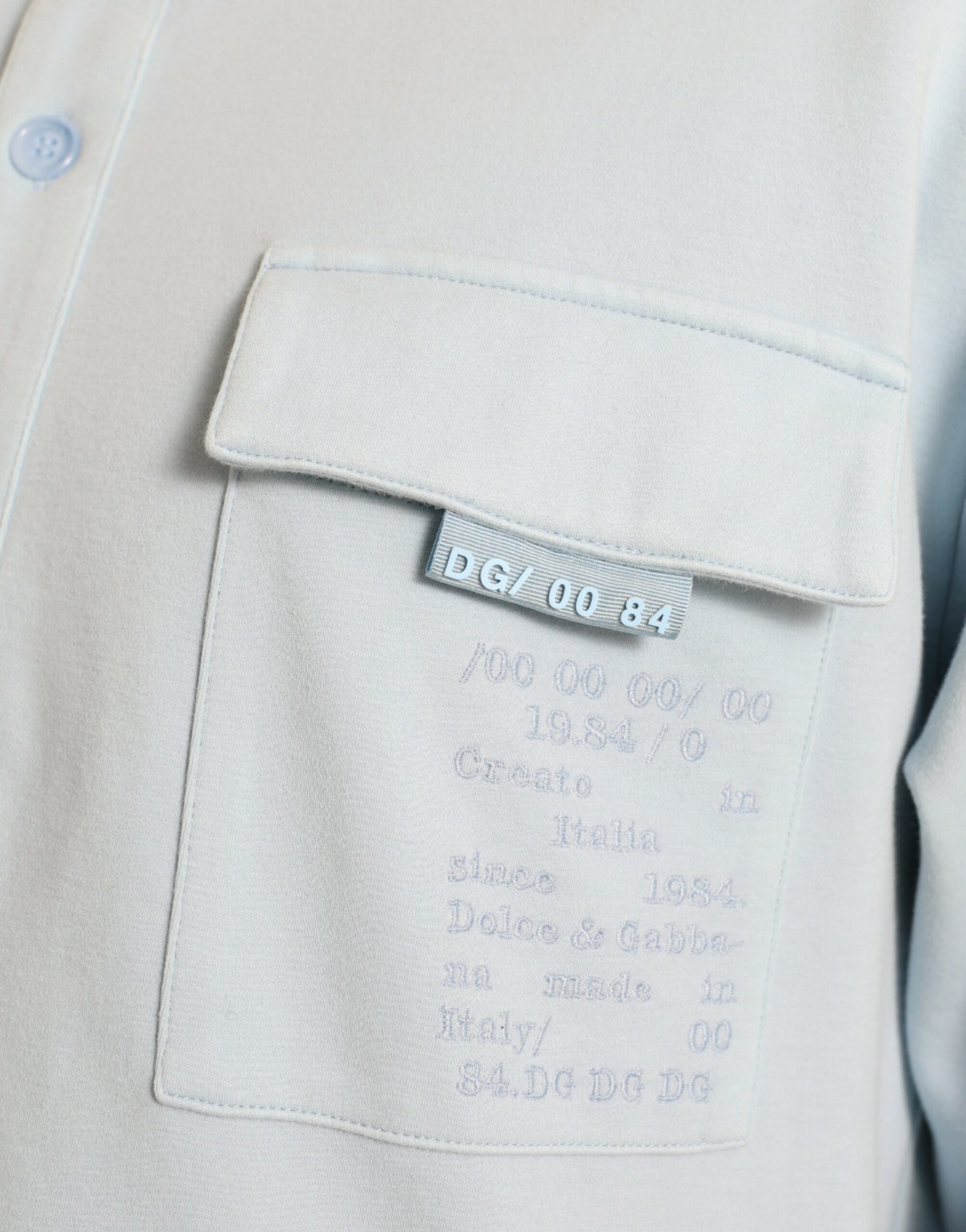 Dolce & Gabbana Light Blue Cotton Buttoned Pullover Sweater by Dolce & Gabbana