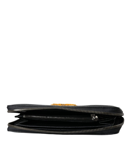 Portefeuille continental zippé en cuir noir Dolce &amp; Gabbana avec patch logo