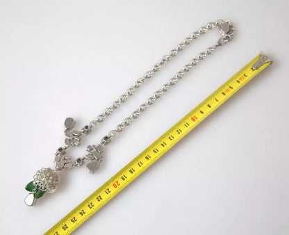 Collier Dolce &amp; Gabbana avec pendentifs roses en cristal transparent et laiton argenté