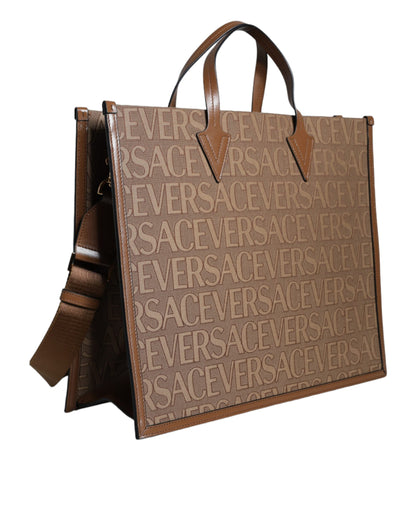 Sac fourre-tout à bandoulière en cuir jacquard marron Versace avec poignée supérieure et logo