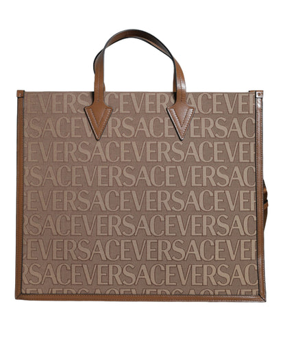 Sac fourre-tout à bandoulière en cuir jacquard marron Versace avec poignée supérieure et logo