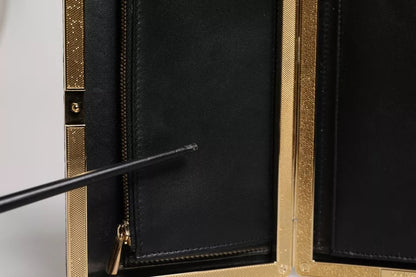 Sac à main de soirée Dolce &amp; Gabbana en cuir noir avec cadre doré