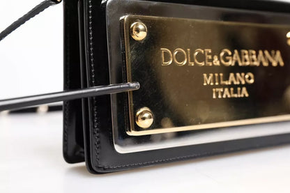 Sac bandoulière Dolce &amp; Gabbana en cuir verni noir avec plaque logo