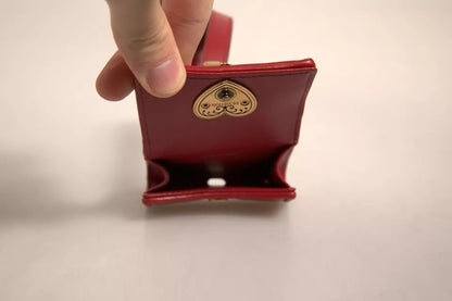 Étui pour Airpods Dolce &amp; Gabbana en cuir noir avec sangle en forme de cœur