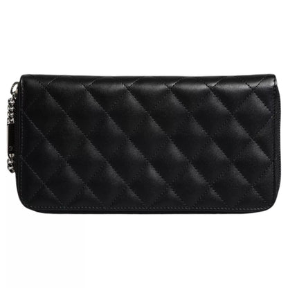 Portefeuille zippé continental Chanel en cuir matelassé noir avec logo CC