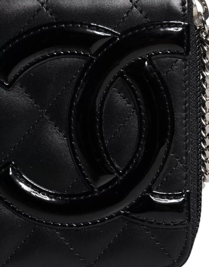 Portefeuille zippé continental Chanel en cuir matelassé noir avec logo CC