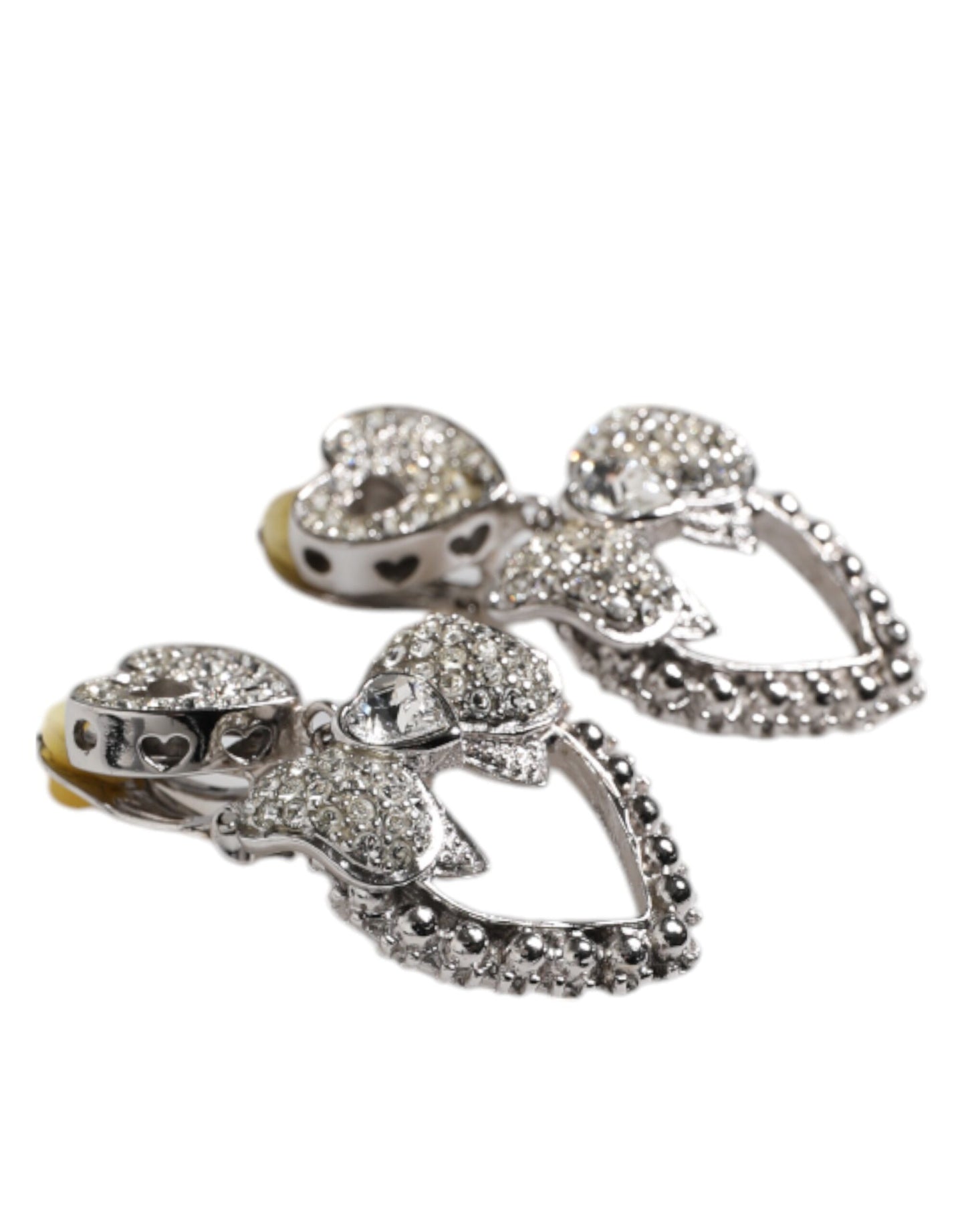 Boucles d'oreilles pendantes à clip Dolce &amp; Gabbana en argent avec nœud en forme de cœur et strass