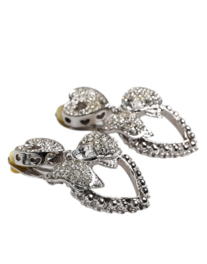 Boucles d'oreilles pendantes à clip Dolce &amp; Gabbana en argent avec nœud en forme de cœur et strass
