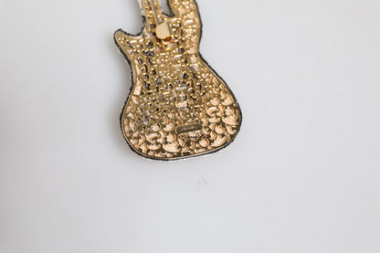 Broche guitare perlée en laiton doré avec logo Dolce &amp; Gabbana