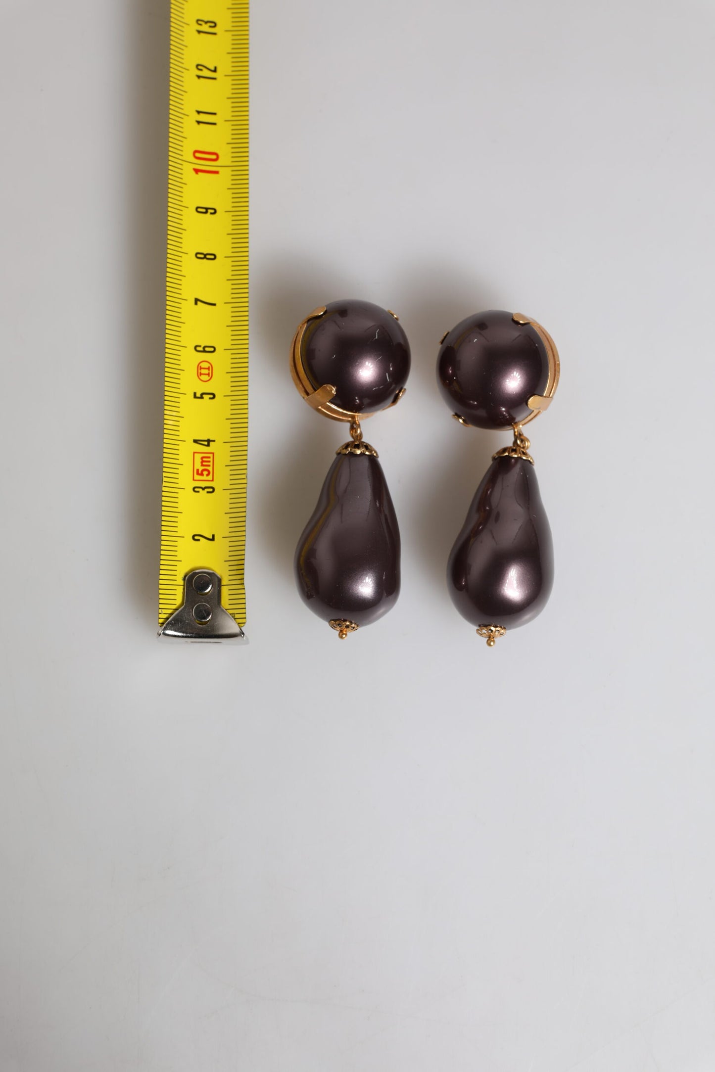 Boucles d'oreilles pendantes à clip Dolce &amp; Gabbana en laiton doré et perles noires