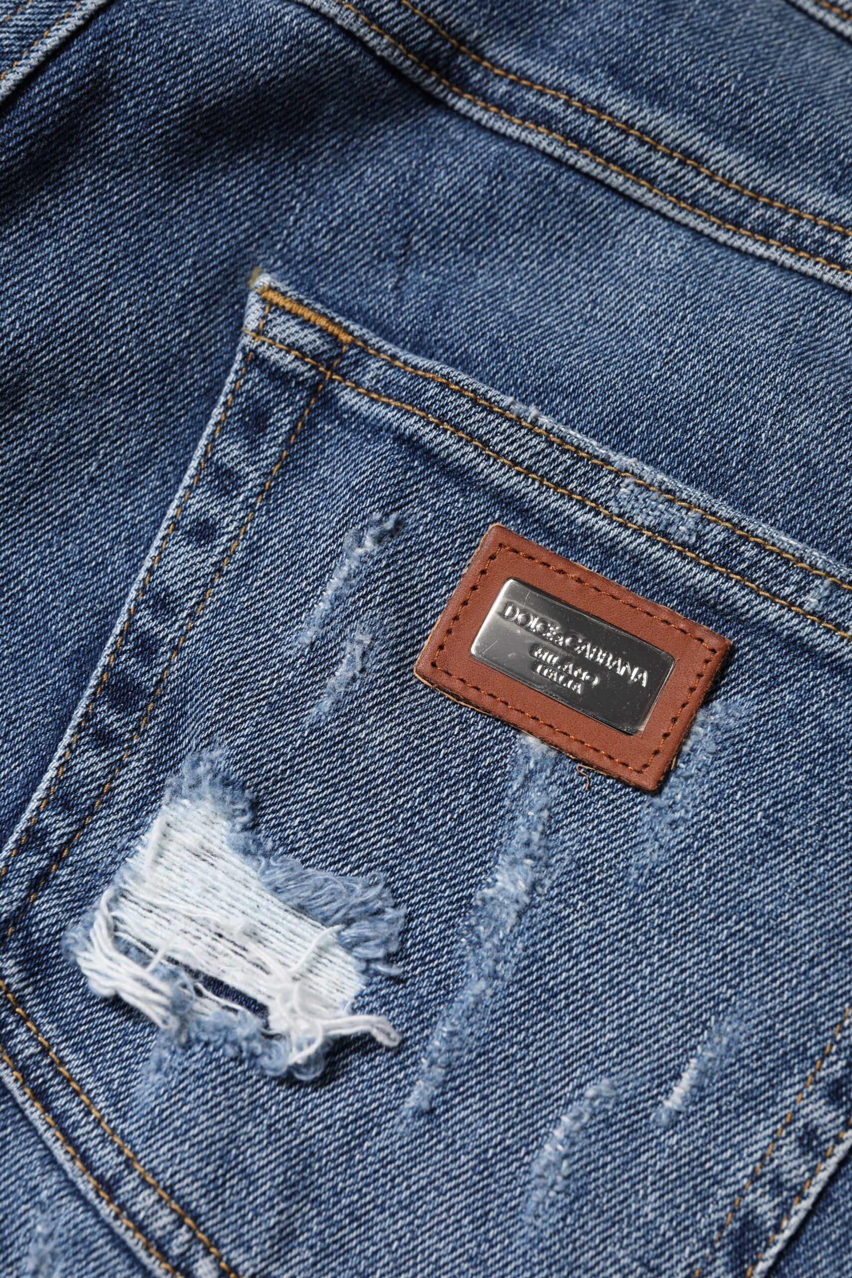 Dolce & Gabbana Blue Tattered Cotton Low Waist Denim Jeans by Dolce & Gabbana