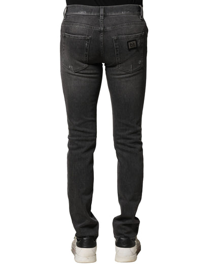 Dolce & Gabbana Black Washed Tattered Slim Fit Denim Jeans by Dolce & Gabbana