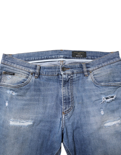 Jean en denim bleu délavé avec plaque logo Dolce &amp; Gabbana