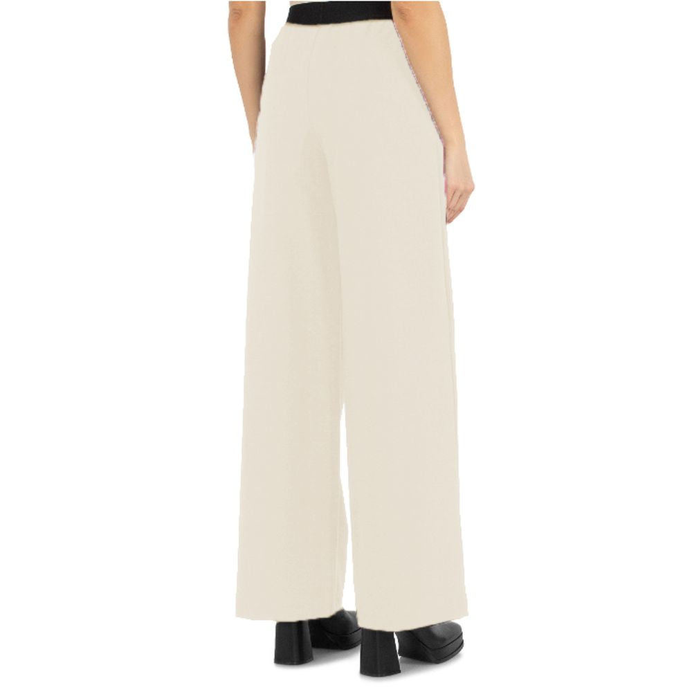 Comme Des Fuckdown Beige Polyester Jeans & Pant by Comme Des Fuckdown